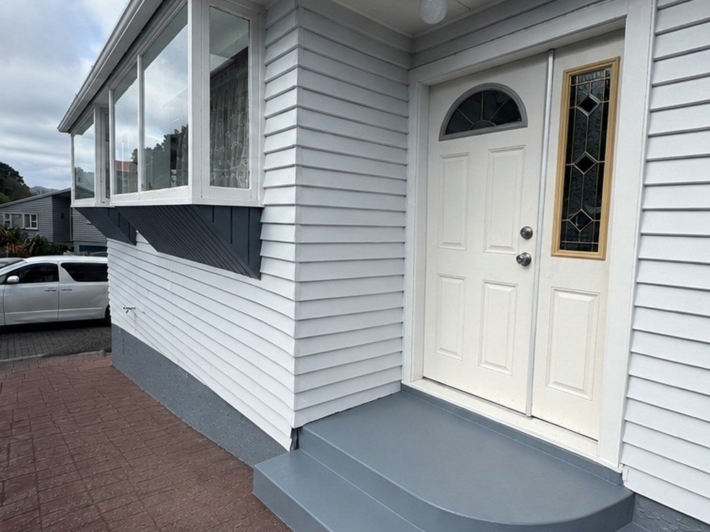 House entryway after exterior repaint with new steps, Wellington