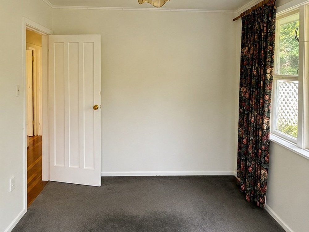 Bedroom after wallpaper removal and repaint, Wellington